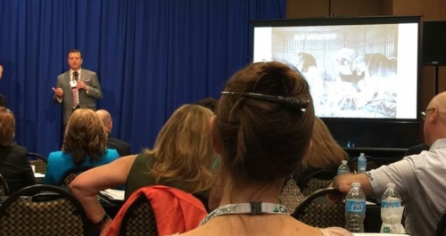 On stage at Speaking Consulting Network with Margy Schaller